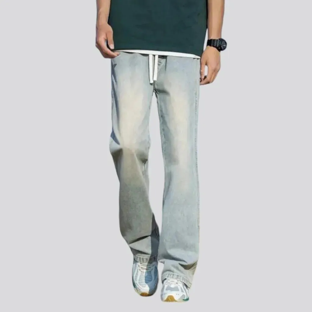 Pebble-washed men's fashion jeans