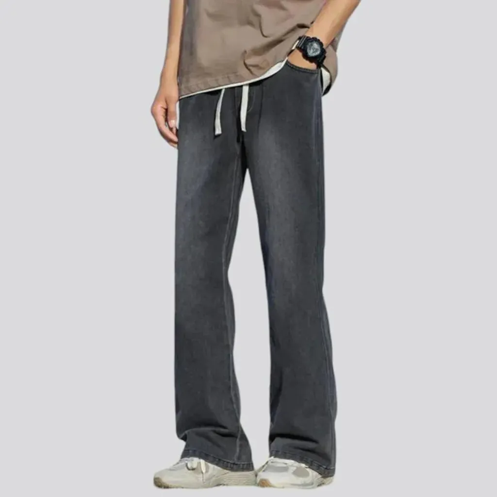 Pebble-washed men's fashion jeans